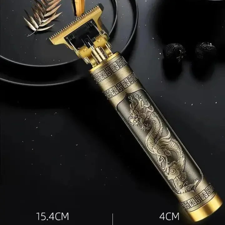 Close-up of a dragon engraved cordless T-blade hair trimmer with an all-metal body and precision cutting blade, designed for professional haircuts, beard trimming, and barber styling.